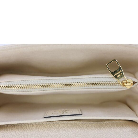 Louis Vuitton  Metis East West Pochette Empreinte Leather Crossbody Bag Cream - Picture 13 of 15